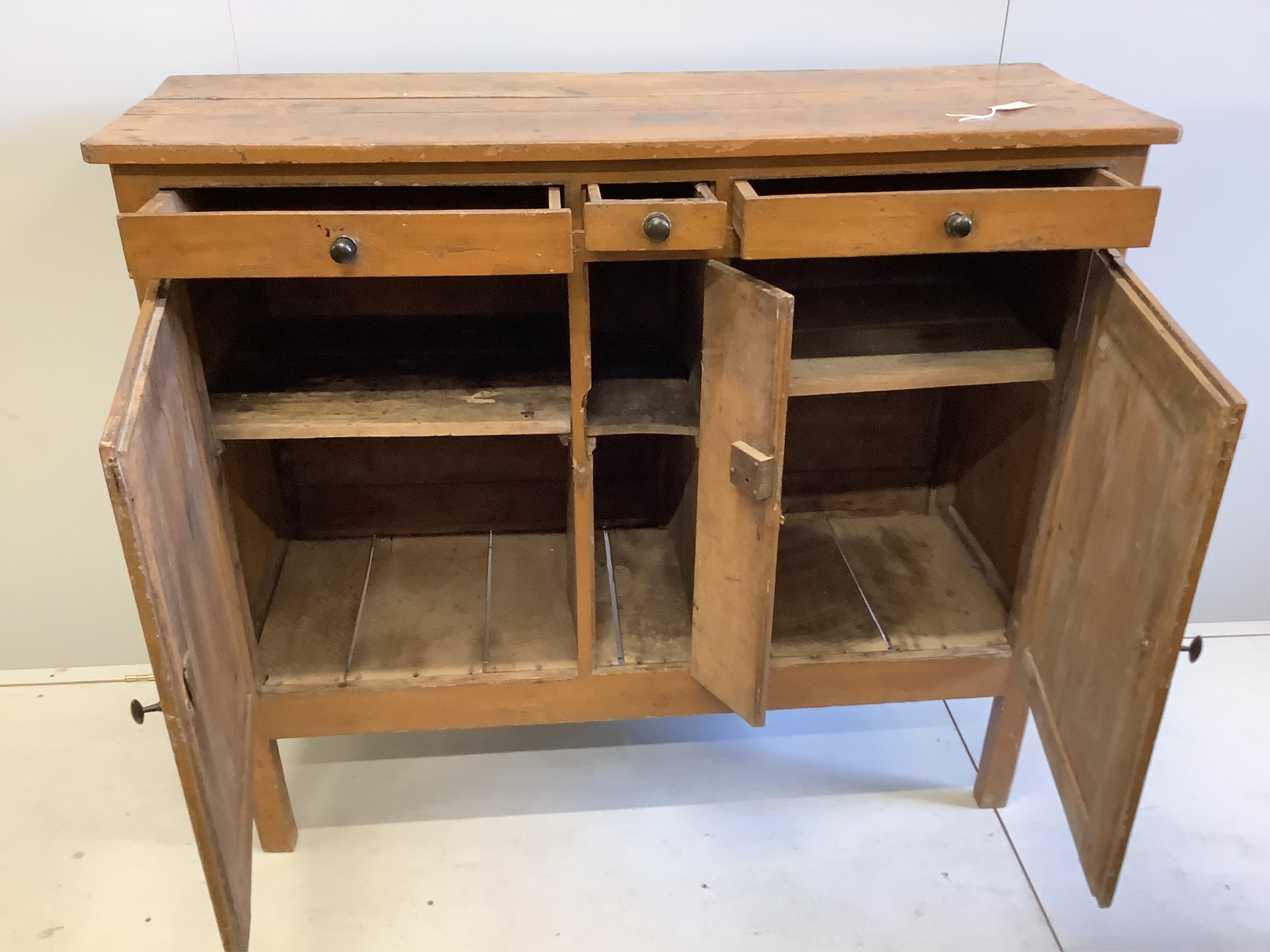 An early 19th century Continental part painted pine and fruitwood side cabinet, width 133cm, depth 48cm, height 116cm